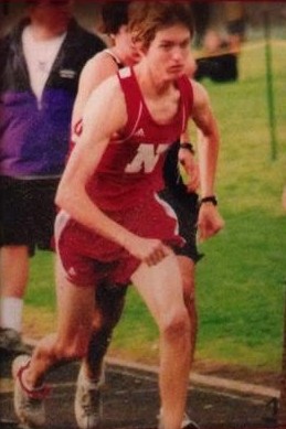 Dr. Stephens running in a Northwest cross country singlet